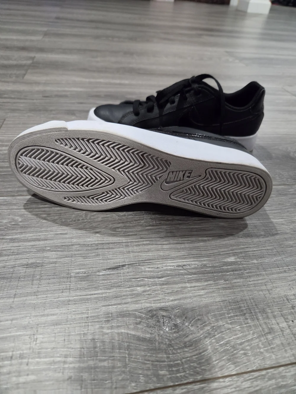 Nike Black Leather Low-Top Sneakers with White Sole